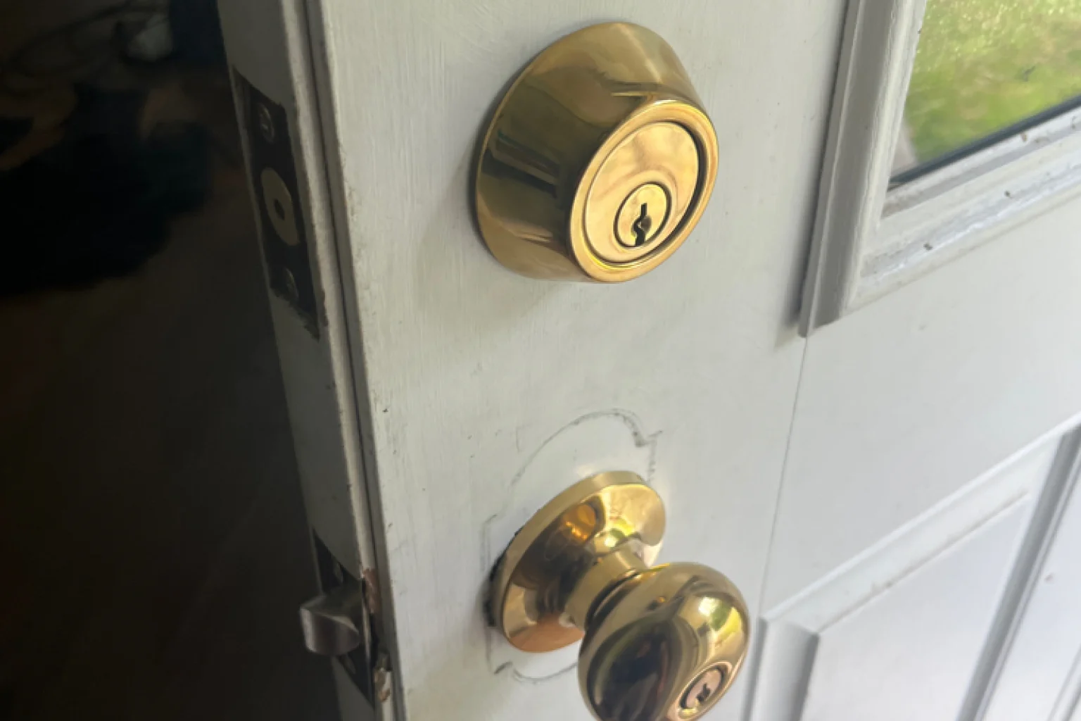 Gold door lock hardware installation